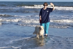 woman and dog by ocean (photo by EM)